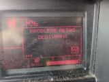 a close up of a car dashboard with a clock on it