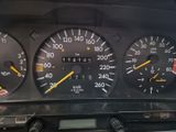 a close up of a dashboard of a car with various gauges