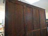 an image of a bedroom with a bed and a closet