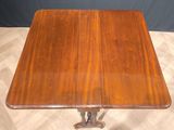 an image of a wooden table on a wooden floor