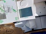 a box full of electronic devices sitting on top of a blue table