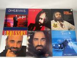four lp ' s of various music from the 70s ' s including the beatles, the doors, the doors