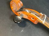 a violin that is sitting on a table