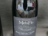 a bottle of wine that is sitting on a table