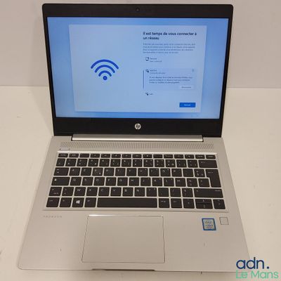a laptop that has a wifi connection on the screen