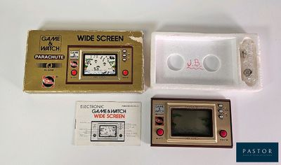 three electronic gadgets sitting on a table next to each other