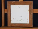 a picture of an easel with a picture on it