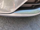 a close up view of a car ' s front bumper