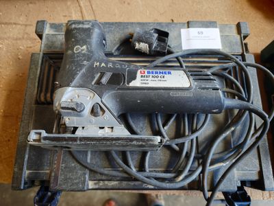 a picture of a power tool sitting on top of a table