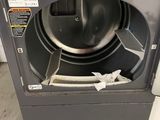 an image of a washing machine with a bowl inside of it