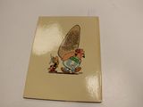 a book with a picture of a man holding a surfboard