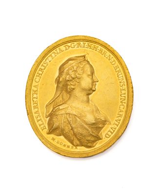 l'image d'une pièce d'or sur laquelle figure le visage d'une femme