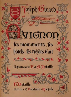 a close up of a book with a red and black design