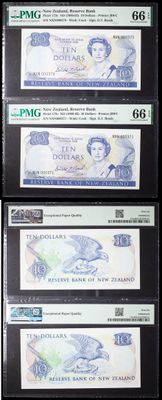 four different bank notes are on display on a black surface
