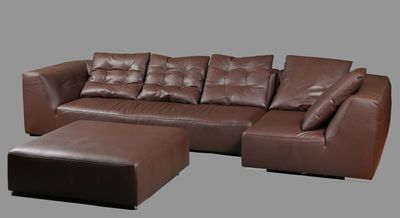 LIGNE ROSET. Ensemble comprenant un canapé d'angle et un ott…