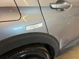 a close up of a car door with a sticker on it