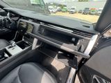 the interior of a car with a dashboard and steering controls