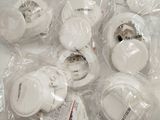 a lot of headphones that are wrapped in plastic