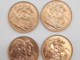 quatre pièces de monnaie britanniques différentes sur un fond blanc