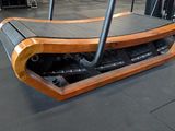 a wooden tread on the ground in a gym