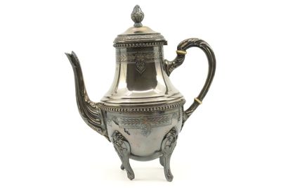 an antique silver teapot with a handle on a white background