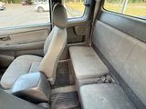 a picture of the inside of a car with the seats down