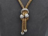 a close up of a necklace on a mannequin mannequin mannequin mannequin mannequin mannequin mannequin mannequin