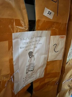 a cardboard box with a sign on it that says it ' s time to buy
