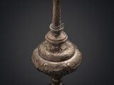 an image of a silver vase on a black background