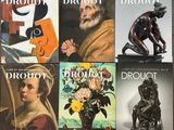 several books of drouot and drouot are stacked on a table