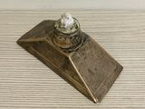 a small metal object that is on a table