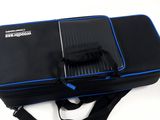 a black bag with a blue stripe on the inside of it