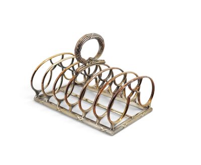 a close up of a metal rack with rings on it