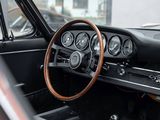 a dashboard and steering wheel of a car in a car showroom