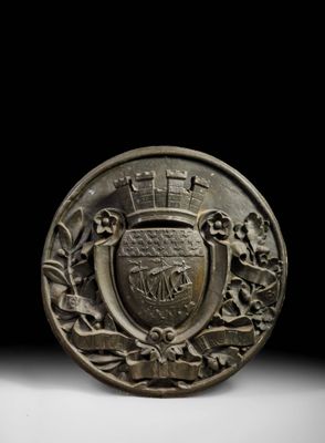 a close up of a coin with a coat of arms on it