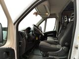 a white van with black seats and a steering wheel