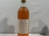 a bottle of wine that is sitting on a table