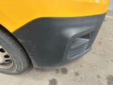 a close up of a yellow truck with a black bumper