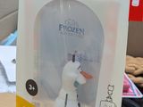 a plastic figure of a snowman in a package