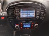 the dashboard of a car with a radio and a steering control
