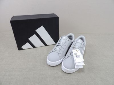 adidas superstar shoes in grey and white with a box