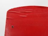 a red hat that is sitting on top of a table
