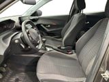 the interior of a car with a steering wheel and a dashboard