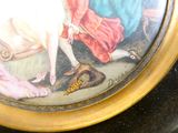 a picture of a painting of a woman feeding a cow