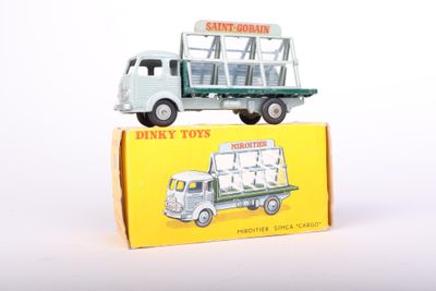 a toy truck that is sitting on top of a box