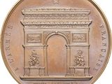 an image of a bronze medal with the arc of triumph on it