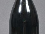 a bottle of wine that is sitting on a table