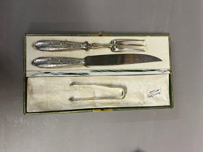 Pince à sucre en argent à décor rocaille - Photo 1