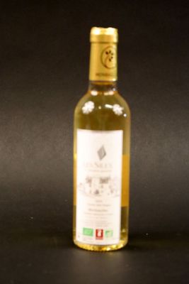 a bottle of wine that is sitting on a table