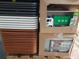 a stack of boxes with different types of items in them